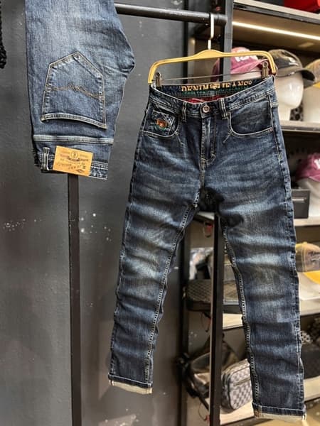 Jean Dài QCCC3K Denim- M6 Slim-Fit xanh was thêu túi thêu chữ